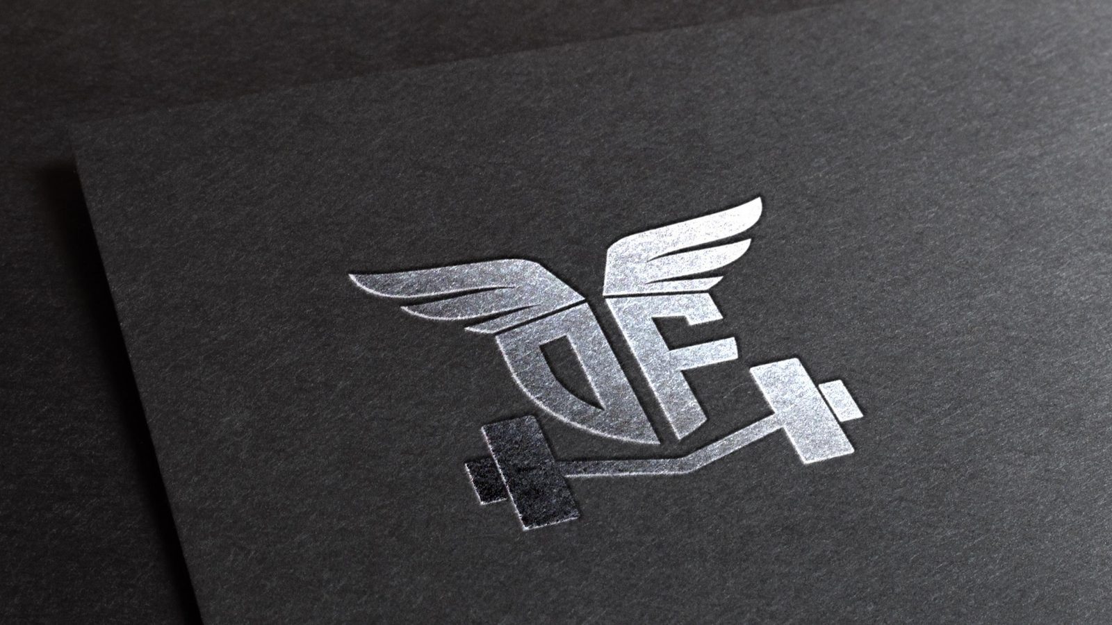 Divine Fitness logo foil-stamped on premium card stock