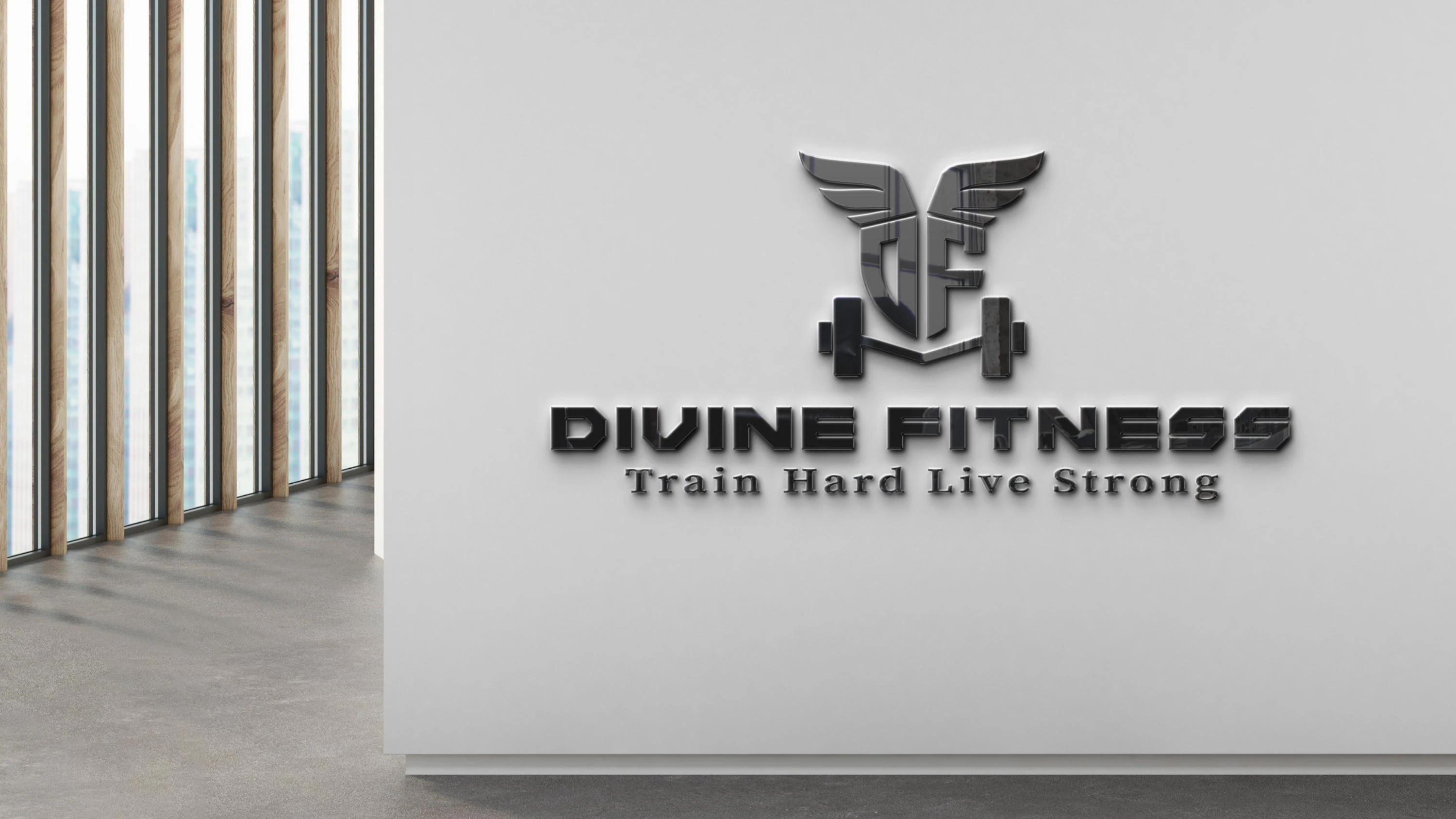 Divine Fitness 3D logo signage on a gym wall